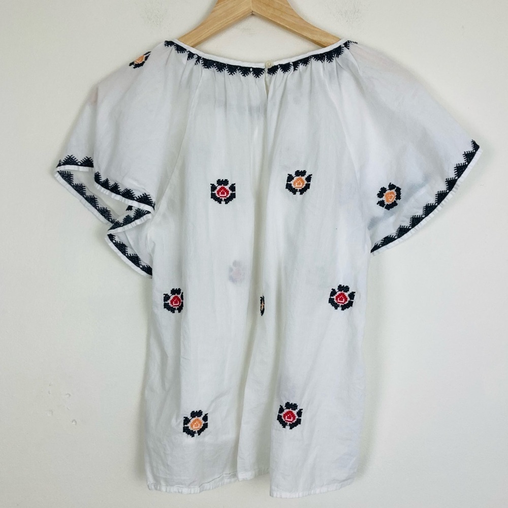 Madewell slightly sheer white cotton top w/ black, red & yellow embroidery. S - Picture 5 of 8